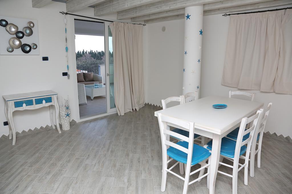 Апартаменты Residenze Gli Ulivi Орозеи Номер фото